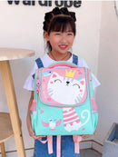 Mochila escolar infantil para niños y niñas con gatito dinosaurio en la espalda