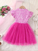 Vestido Infantil com Tule Cintilante e Laço