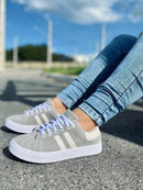 Zapatillas deportivas de rayas para mujer adulta