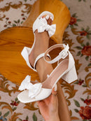 Chunky high heel sandals with bow decorated strap for teens