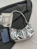 Bolso de hombro de PU con forma de nube, plisado, color liso y acabado brillante, sencillo y elegante, moderno, tipo media luna para mujer.