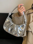 Bolso de hombro de PU con forma de nube, plisado, color liso y acabado brillante, sencillo y elegante, moderno, tipo media luna para mujer.