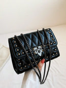 Bolso bandolera de mujer con correa de cadena (2011)