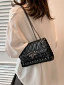 Bolso bandolera de mujer con correa de cadena (2011)