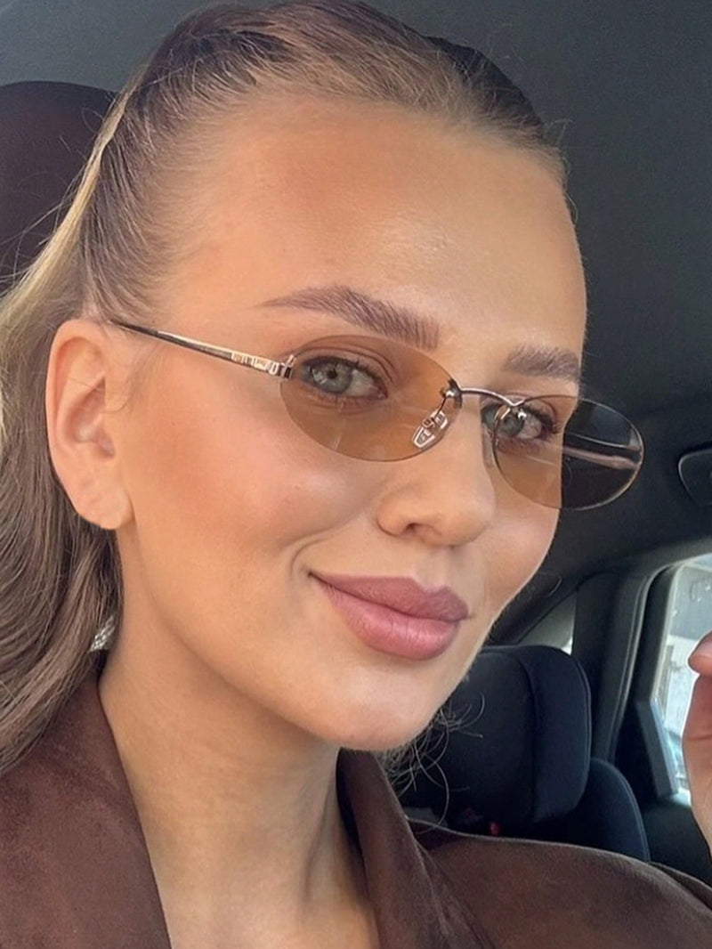 1 par de gafas graduadas con montura de metal ovalada, pequeñas y sin montura, estilo moderno, color champán, adecuadas para uso diario de mujer.