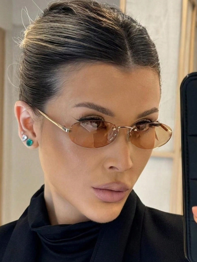 1 par de gafas graduadas con montura de metal ovalada, pequeñas y sin montura, estilo moderno, color champán, adecuadas para uso diario de mujer.