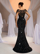 Vestido Preto em Renda – Costas Abertas, Manga Longa e Bordado Floral