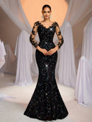 Vestido Preto em Renda – Costas Abertas, Manga Longa e Bordado Floral