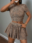 Slaydiva New Spring and Summer Women's Two-Piece Set, Casual Basic Sport Style, Double-Side Ruched Short Sleeve Round Neck Crop Top + Mid-Length Knitted Leopard Print Bell-Length Skirt with Short Swing