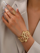 Conjunto de joyas de oro con diseño de máscara facial abstracta, pulsera y anillo anchos, conjunto de joyas de oro para mujer, conjunto de pulsera y anillo metálico extragrande, conjunto de anillo y pulsera a juego